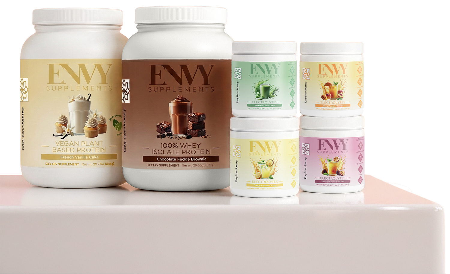Collection of ENVY Supplements protein powder and Electrolytes on a white surface